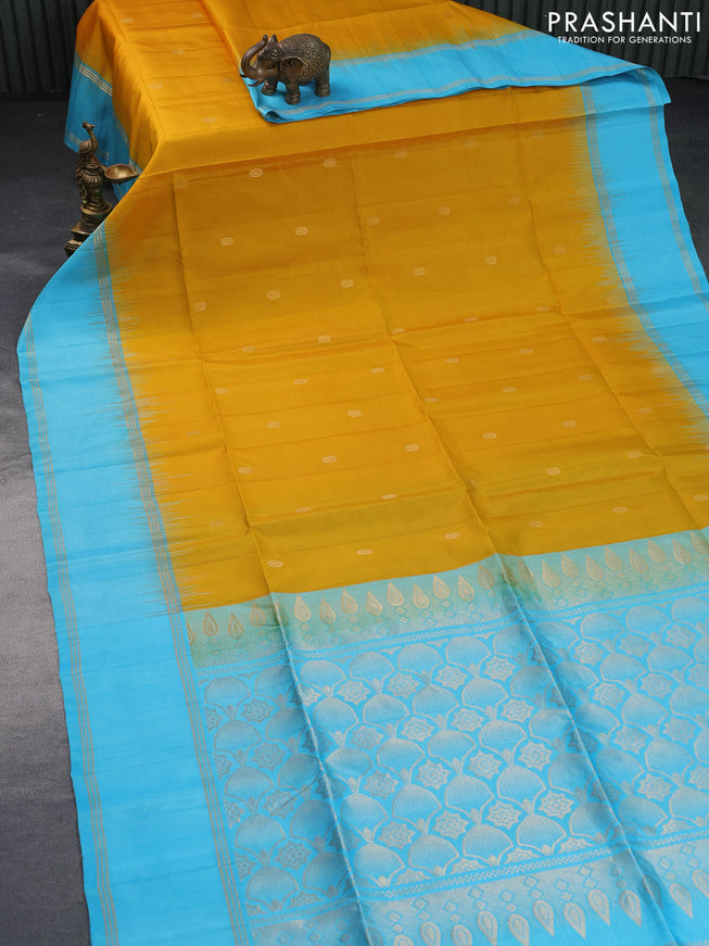 Pure soft silk saree mango yellow and light blue with zari woven buttas and rettapet zari woven border