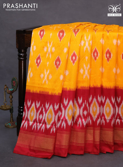 Pochampally silk saree mango yellow and maroon with allover ikat butta weaves and long ikat woven zari border