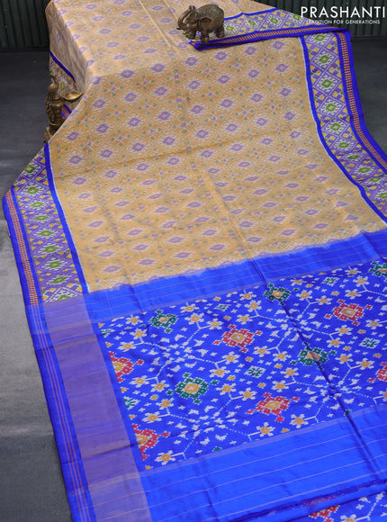 Pochampally silk saree sandal and blue with allover ikat weaves and zari woven ikat border