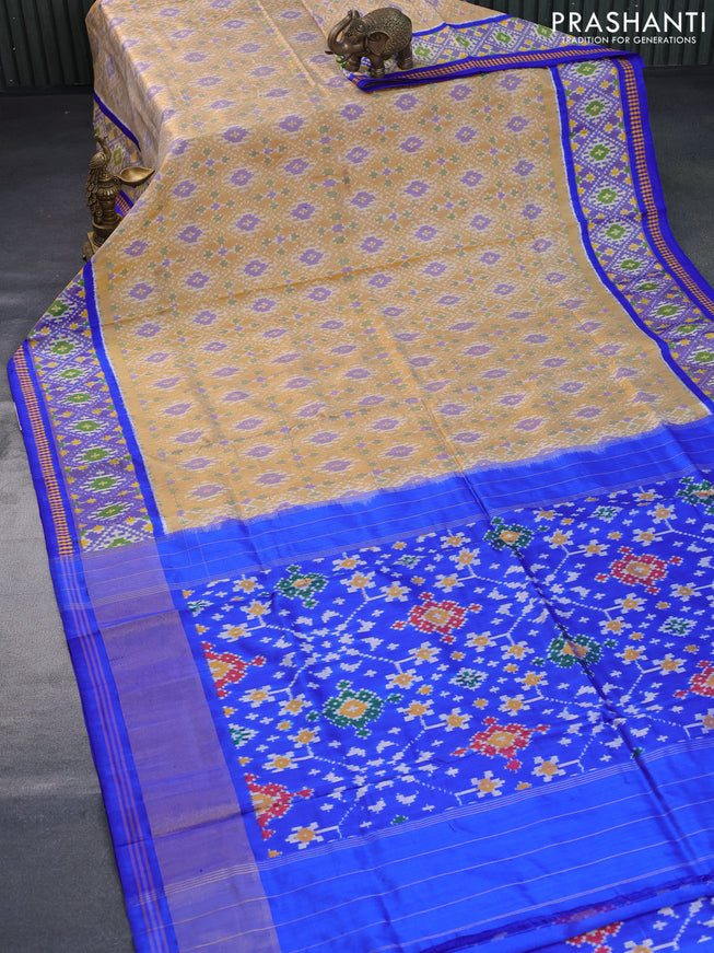 Pochampally silk saree sandal and blue with allover ikat weaves and zari woven ikat border