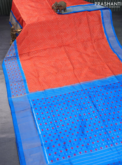 Pochampally silk saree orange and cs blue with allover checks & ikat weaves and zari woven ikat border