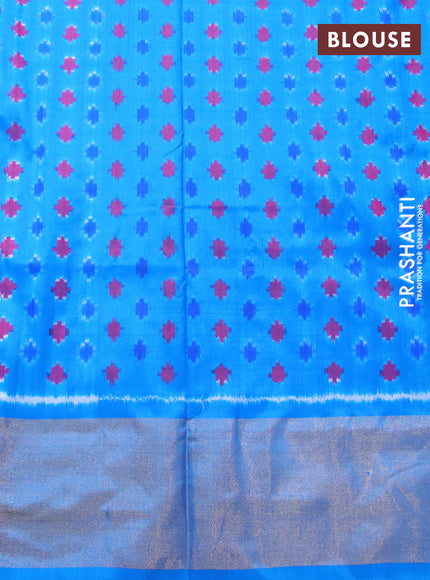 Pochampally silk saree orange and cs blue with allover checks & ikat weaves and zari woven ikat border