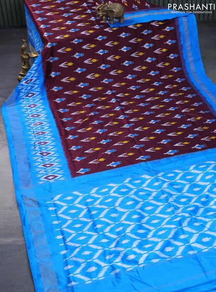 Pochampally silk saree deep maroon and cs blue with allover ikat butta weaves and long ikat woven zari border