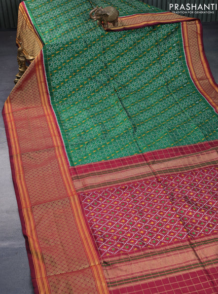 Pochampally silk saree green and maroon with allover zari checks & ikat weaves and long zari woven border