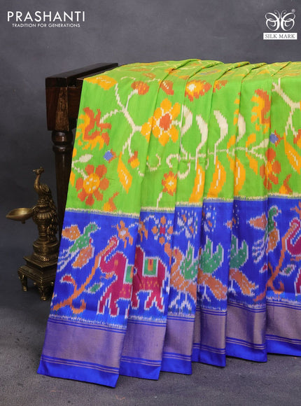 Pochampally silk saree light green and royal blue with allover ikat weaves and long ikat woven zari border