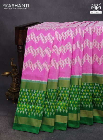 Pochampally silk saree light pink and green with allover ikat weaves and long zari woven ikat border