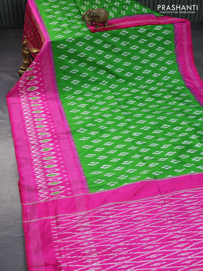 Pochampally silk saree parrot green and pink with allover ikat butta weaves and long zari woven ikat border