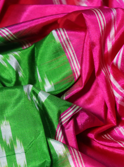 Pochampally silk saree parrot green and pink with allover ikat butta weaves and long zari woven ikat border