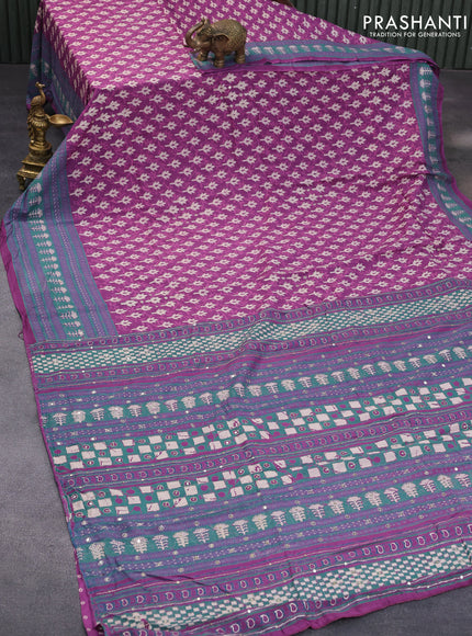 Muslin silk saree purple and green with allover dabu prints & pita work and ajrakh printed border