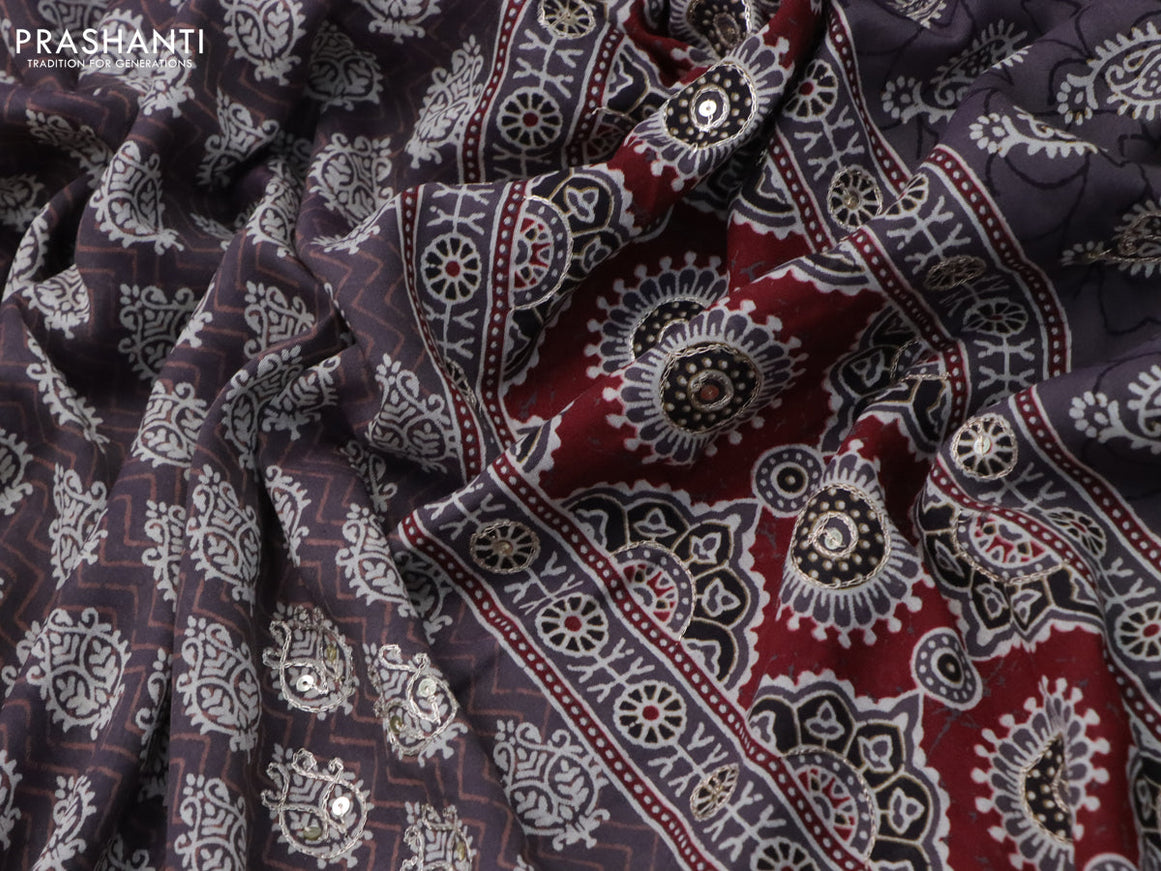 Muslin silk saree grey shade and maroon with allover dabu prints & pita work and ajrakh printed border