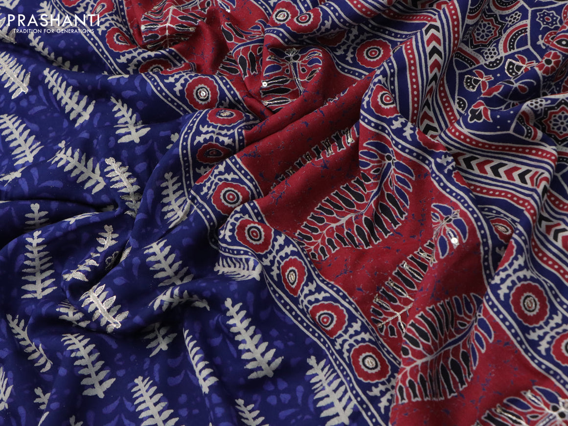 Muslin silk saree blue and maroon with allover dabu prints & pita work and ajrakh printed border