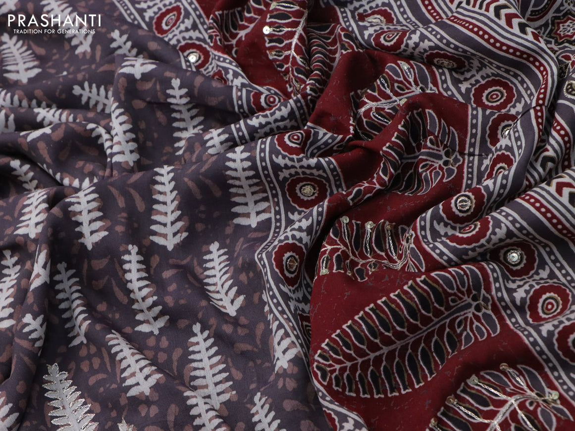 Muslin silk saree grey and maroon with allover dabu prints & pita work and ajrakh printed border