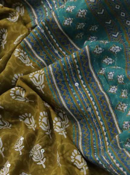 Muslin silk saree mehendi green and teal green with allover dabu prints & pita work and ajrakh printed border