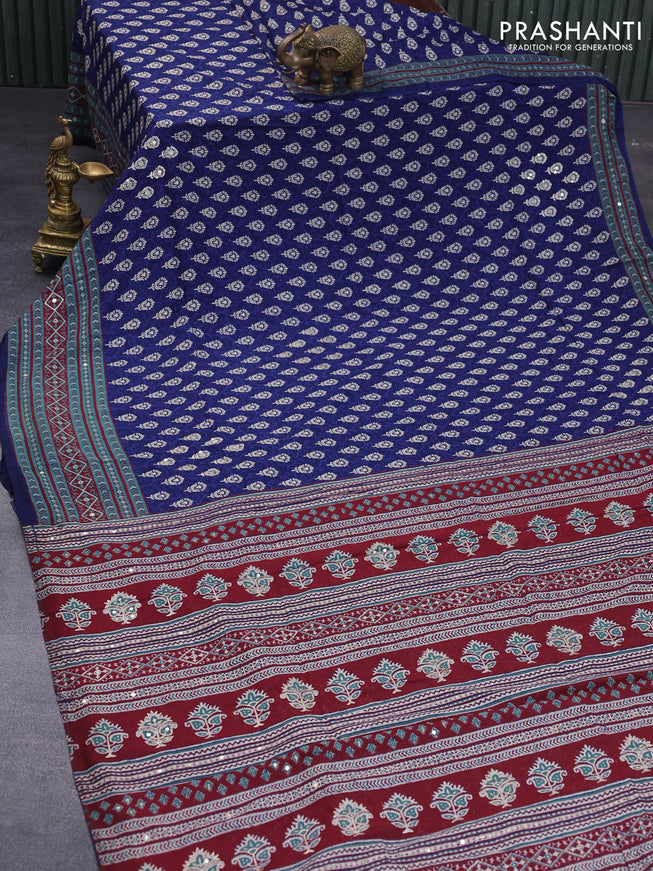 Muslin silk saree blue and green shade maroon with allover dabu prints & pita work and ajrakh printed border