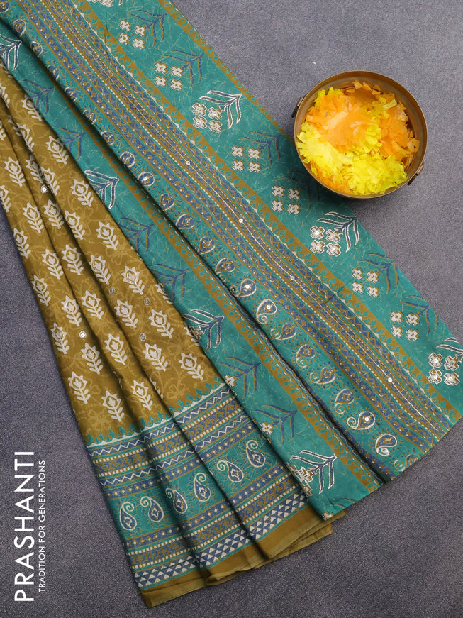 Muslin silk saree mehendi green and green with allover dabu prints & pita work and ajrakh printed border