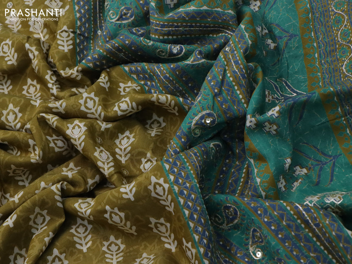 Muslin silk saree mehendi green and green with allover dabu prints & pita work and ajrakh printed border