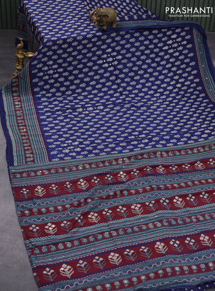 Muslin silk saree blue and green with allover dabu prints & pita work and ajrakh printed border