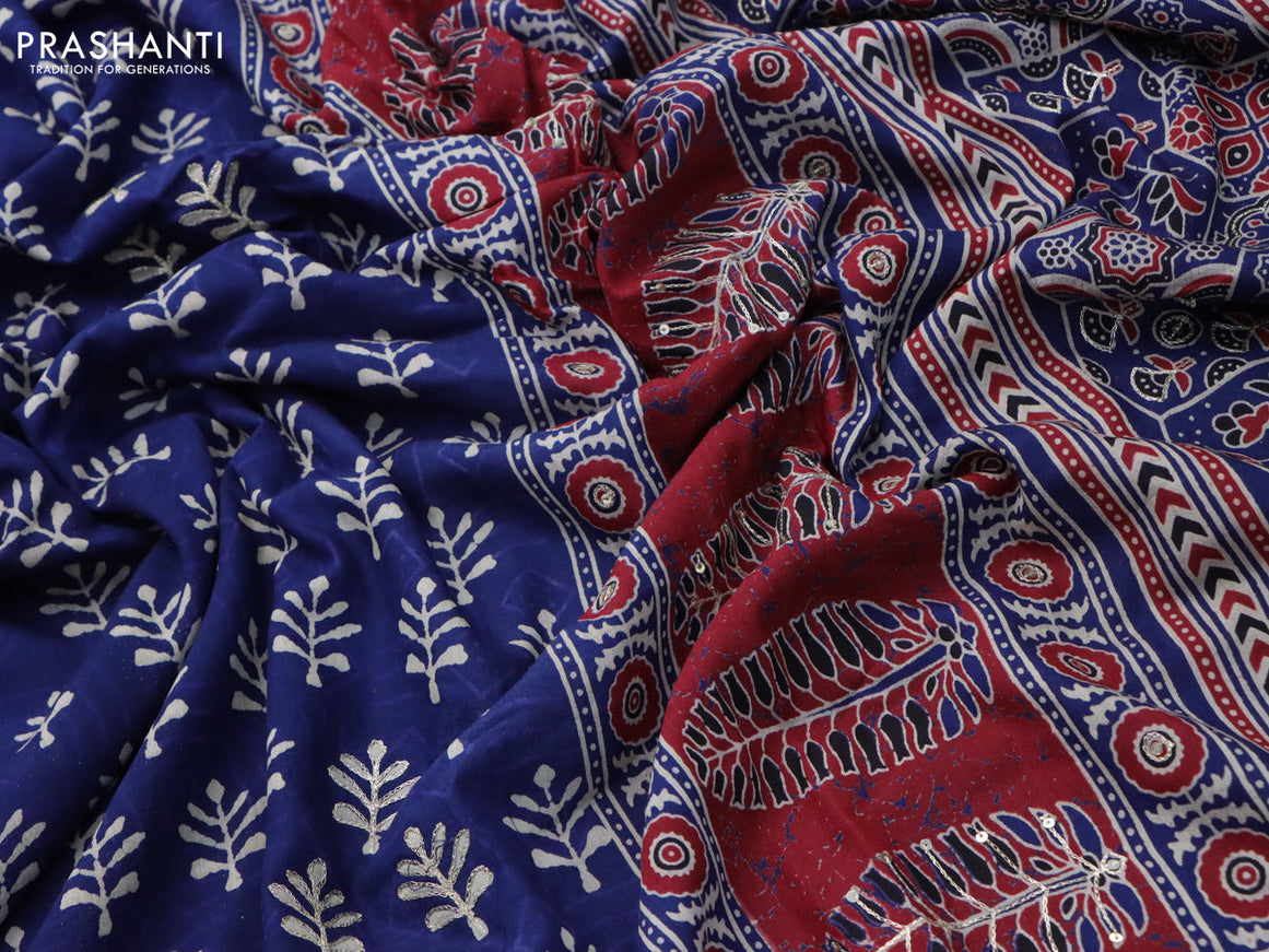 Muslin silk saree blue with allover dabu prints & pita work and ajrakh printed border