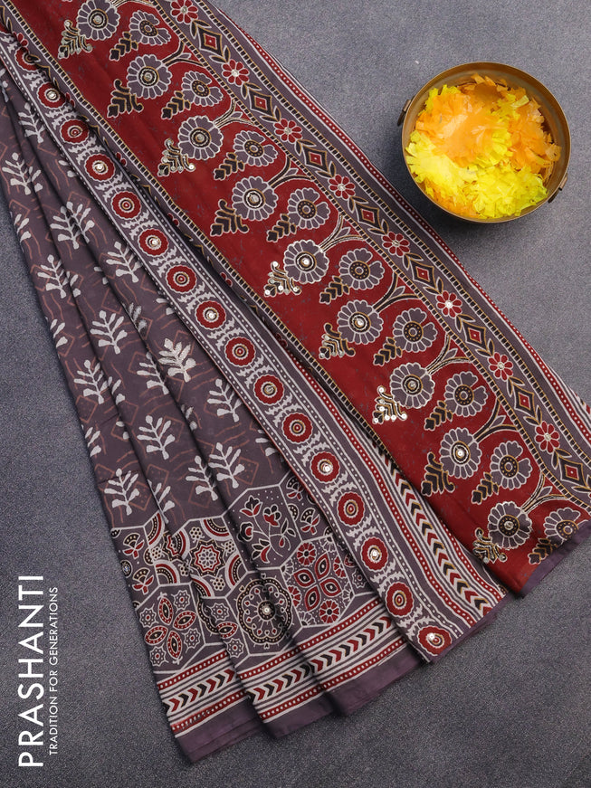 Muslin silk saree grey with allover dabu prints & pita work and ajrakh printed border