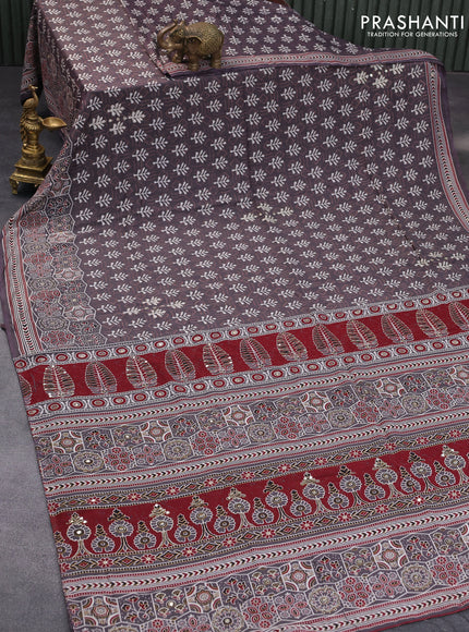 Muslin silk saree grey with allover dabu prints & pita work and ajrakh printed border