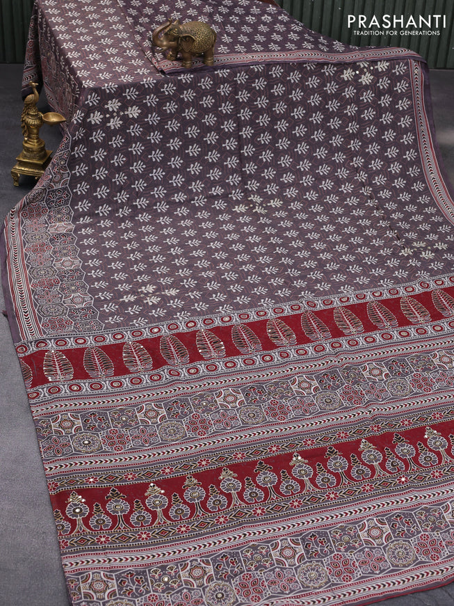 Muslin silk saree grey with allover dabu prints & pita work and ajrakh printed border