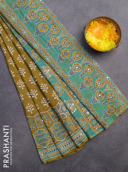 Muslin silk saree mehendi green with allover dabu prints & pita work and ajrakh printed border