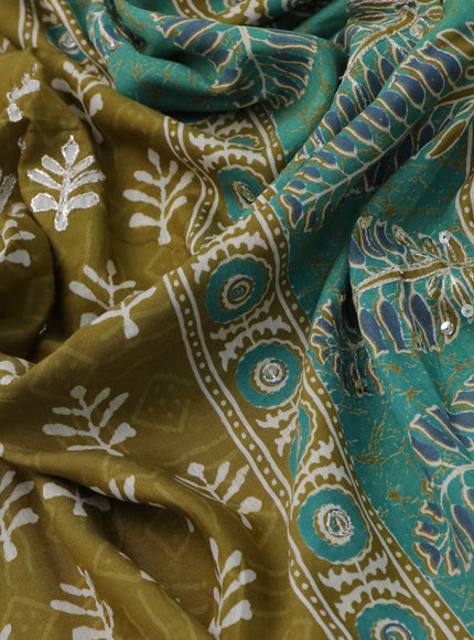 Muslin silk saree mehendi green with allover dabu prints & pita work and ajrakh printed border