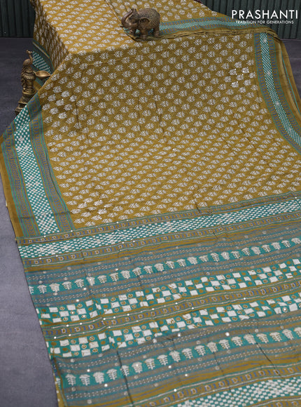 Muslin silk saree mehendi green and green with allover butta prints & pita work and printed border