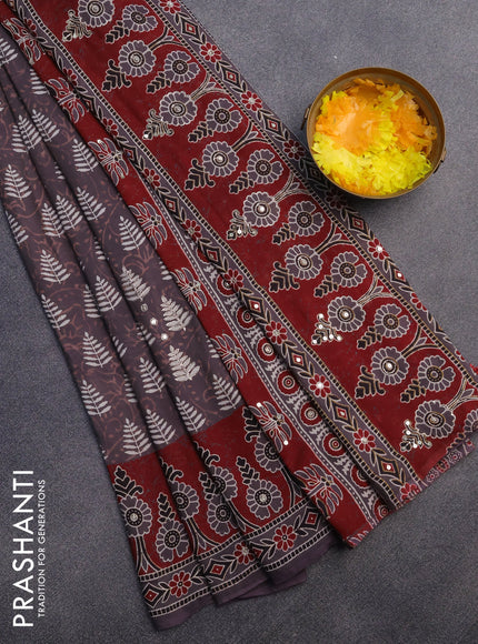 Muslin silk saree deep jamun shade and maroon with allover dabu prints & pita work and ajrakh printed border