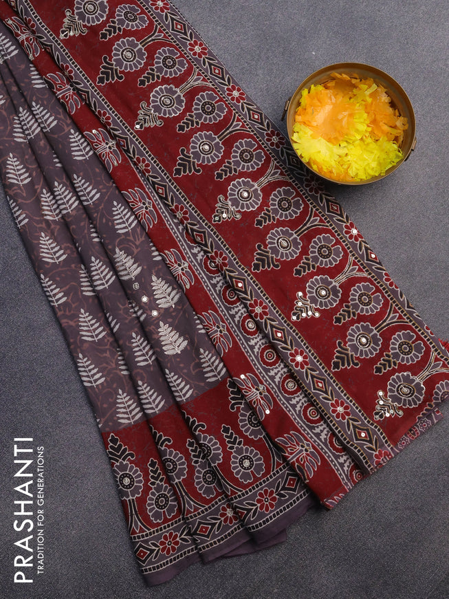 Muslin silk saree deep jamun shade and maroon with allover dabu prints & pita work and ajrakh printed border