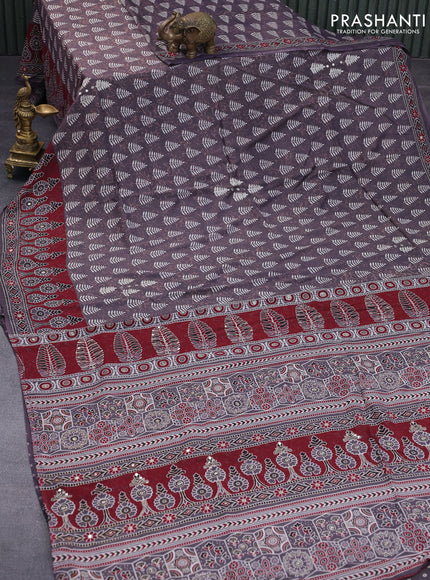 Muslin silk saree deep jamun shade and maroon with allover dabu prints & pita work and ajrakh printed border