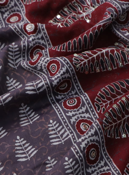 Muslin silk saree deep jamun shade and maroon with allover dabu prints & pita work and ajrakh printed border