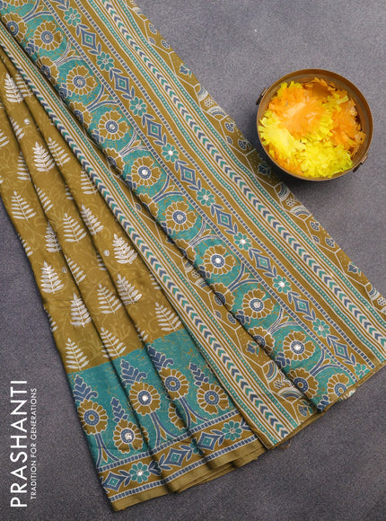 Muslin silk saree mehendi green and teal green with allover dabu prints & pita work and ajrakh printed border