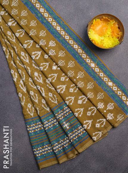 Muslin silk saree mehendi green and green with allover dabu prints & pita work and ajrakh printed border