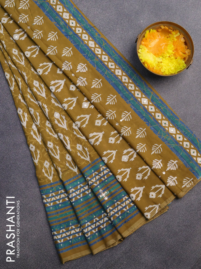 Muslin silk saree mehendi green and green with allover dabu prints & pita work and ajrakh printed border