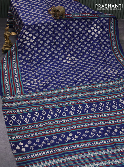 Muslin silk saree blue with allover butta prints & pita work and batik printed border