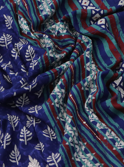 Muslin silk saree blue with allover butta prints & pita work and batik printed border