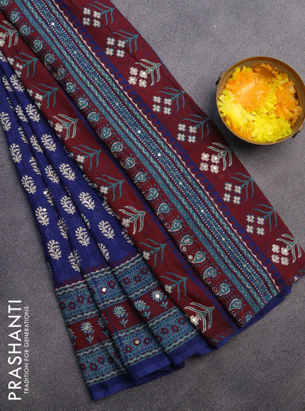 Muslin silk saree blue and maroon with allover dabu prints & pita work and ajrakh printed border