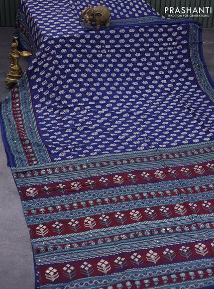 Muslin silk saree blue and maroon with allover dabu prints & pita work and ajrakh printed border