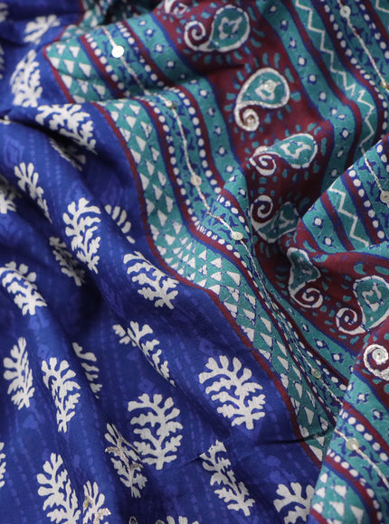 Muslin silk saree blue and maroon with allover dabu prints & pita work and ajrakh printed border