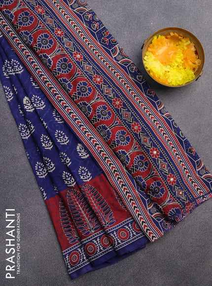 Muslin silk saree blue and maroon with allover dabu prints & pita work and ajrakh printed border