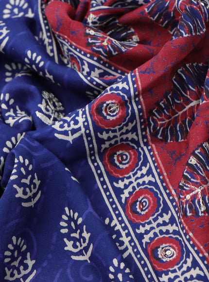 Muslin silk saree blue and maroon with allover dabu prints & pita work and ajrakh printed border