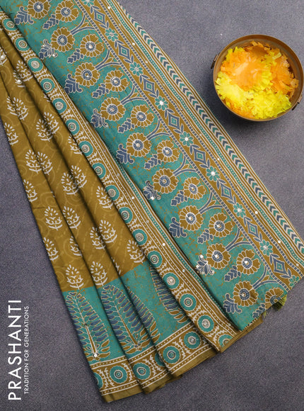 Muslin silk saree mehendi green and green with allover dabu prints & pita work and ajrakh printed border