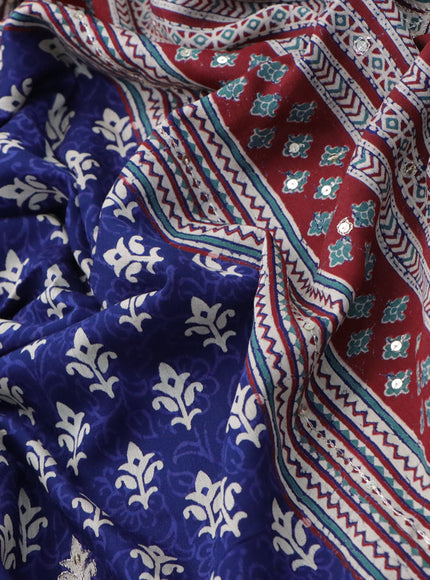 Muslin silk saree blue and maroon with allover dabu prints & pita work and ajrakh printed border