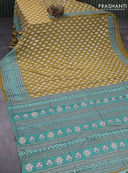 Muslin silk saree mehendi green and green with allover dabu prints & pita work and ajrakh printed border