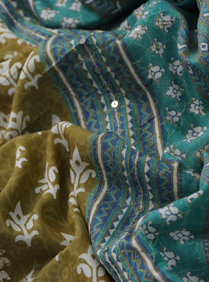 Muslin silk saree mehendi green and green with allover dabu prints & pita work and ajrakh printed border