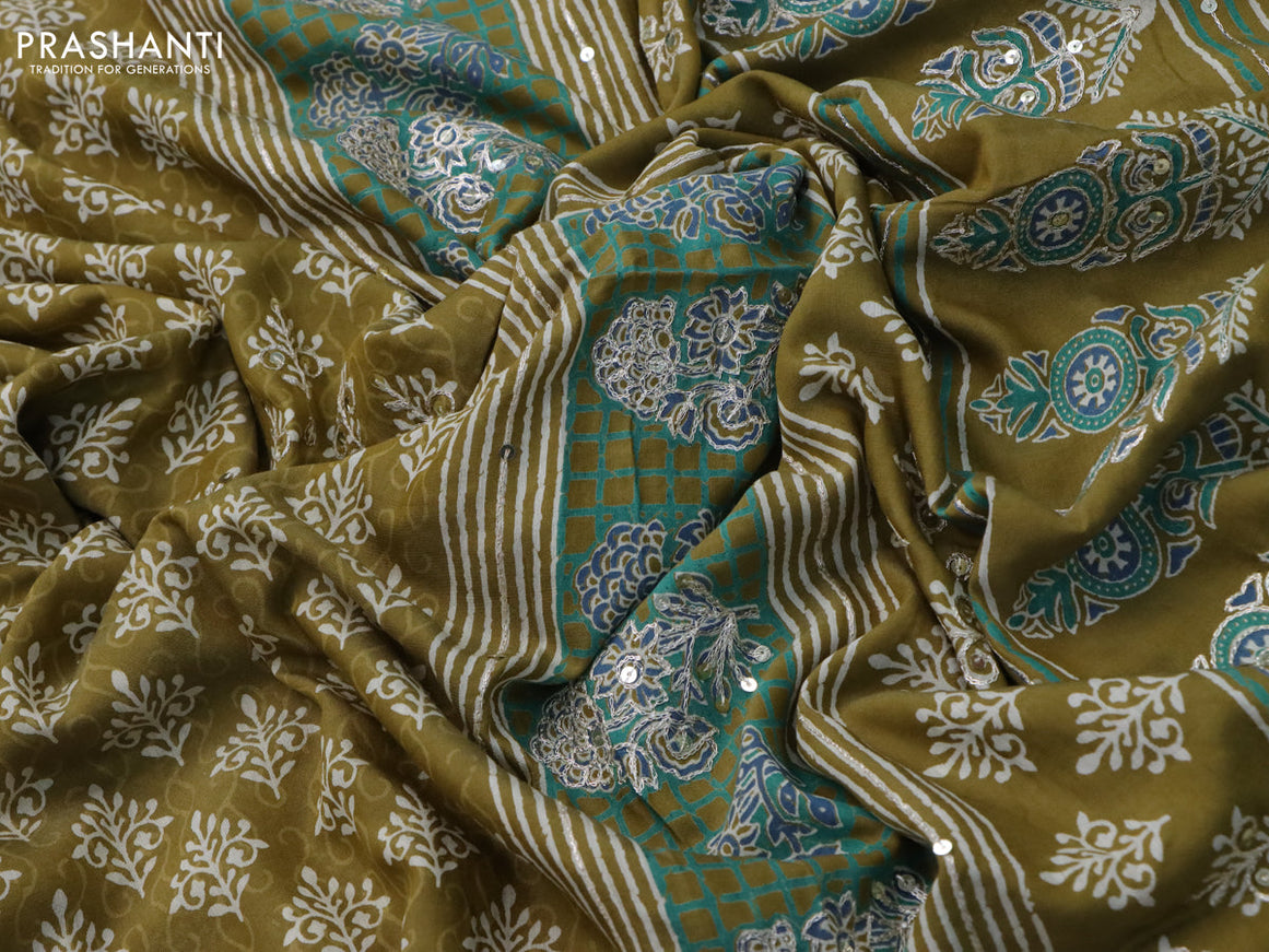 Muslin silk saree mehendi green with allover dabu prints & pita work and ajrakh printed border