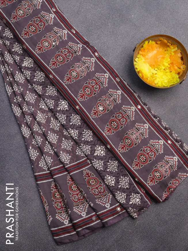 Muslin silk saree grey shade with allover dabu prints & pita work and ajrakh printed border