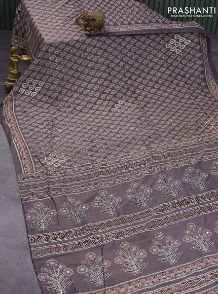 Muslin silk saree grey shade with allover butta prints & pita work and ajrakh printed border