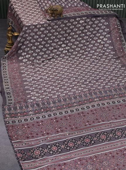 Muslin silk saree grey with allover dabu prints & pita work and ajrakh printed border